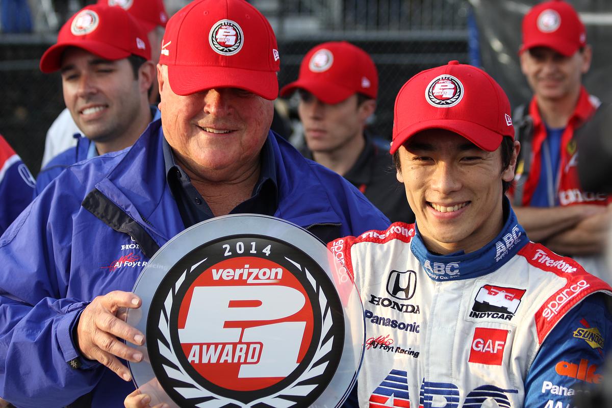 AJ Foyt and Takuma Sato share the Verizon P1 Pole Award after Sato scored the pole for the St. Pete Grand Prix. Saturday, March 29, 2014, in St. Petersburg, Fla. The race starts Sunday afternoon. (Chris Jasurek/Epoch Times)